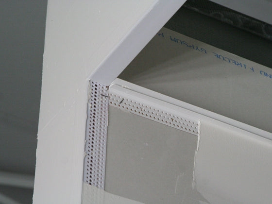 Reborde de barro en techo Trim-Tex