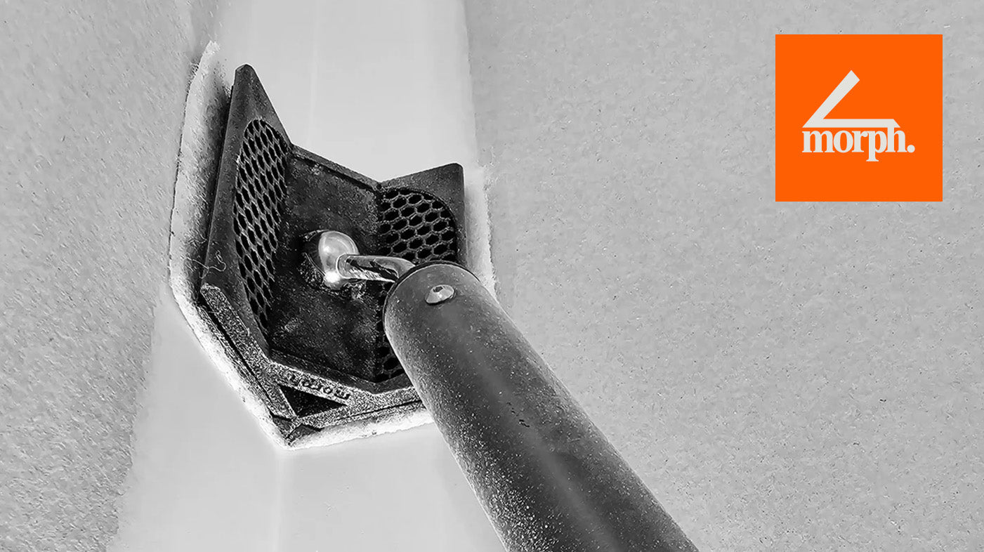 Close-up shot of a morph sander in action, smoothing a surface with precision